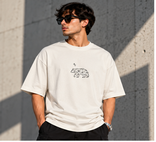 Model wearing the Selinx WILD BLOOM off-white oversized tee, front view with geometric bear graphic