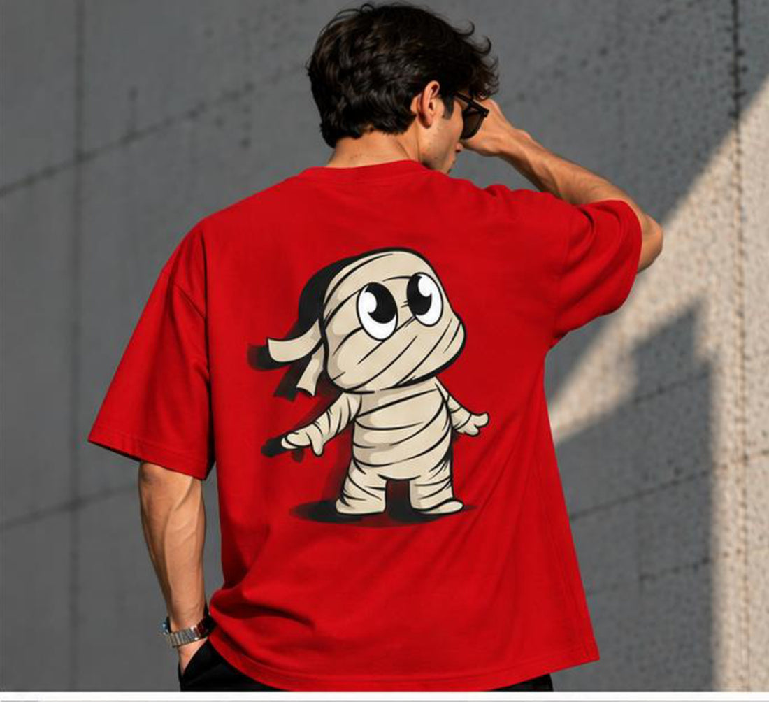 Back view of the Selinx OUTSIDE THE BOX red tee with cartoon mummy character artwork